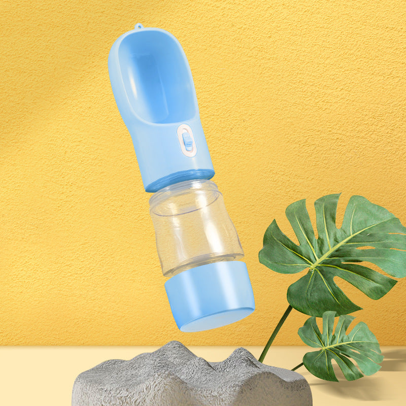 Blue pet water bottle on a yellow background with a plant for dog