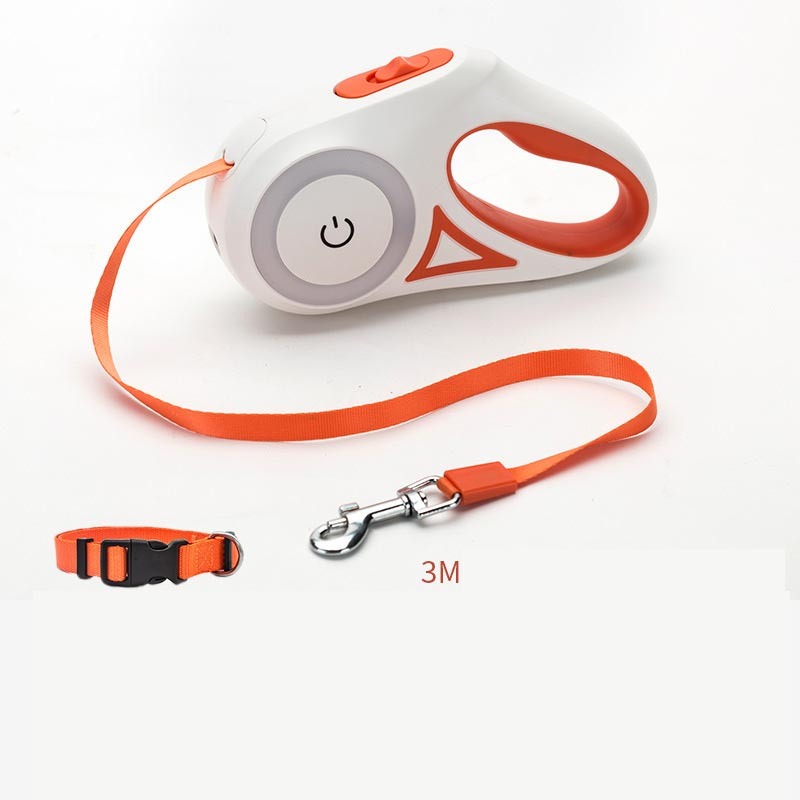 Retractable dog leash with white handle and orange accents on a white background