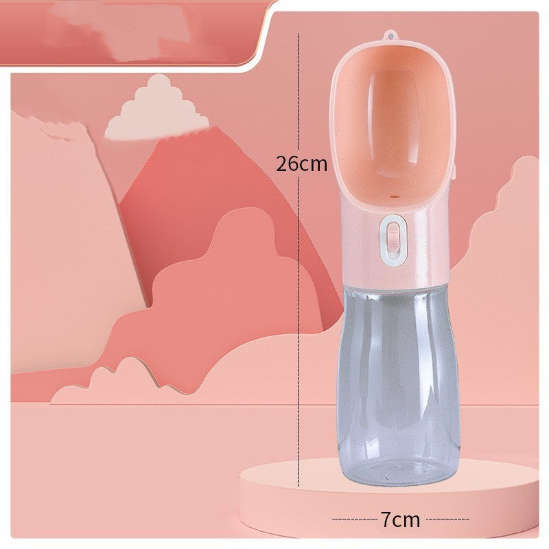 Clear water bottle with pink top on a pink background with measurements