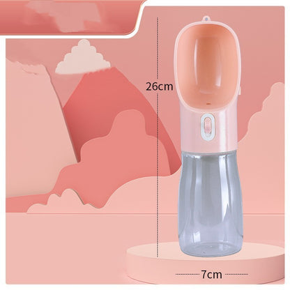 Clear water bottle with pink top on a pink background with measurements